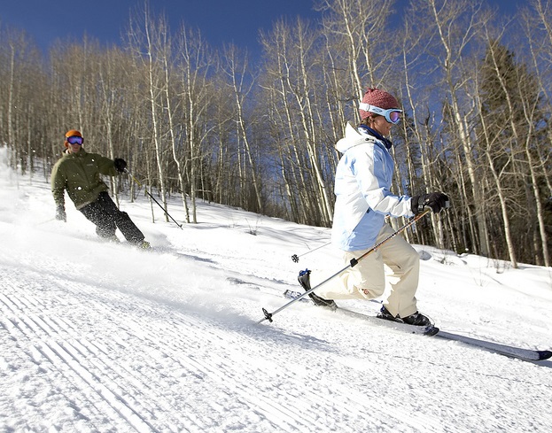 two people skiing