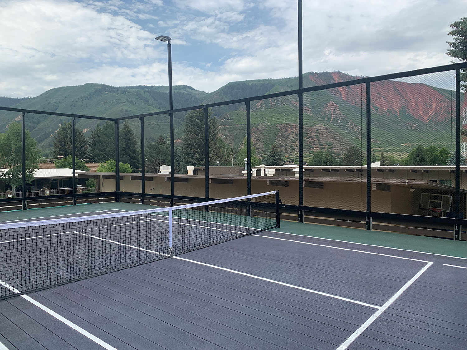 tennis courts with mountain views